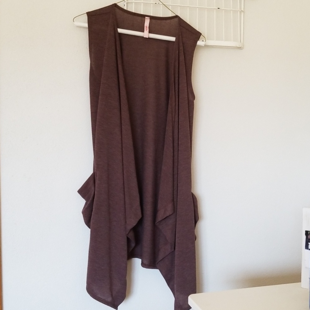 Long brown vest.